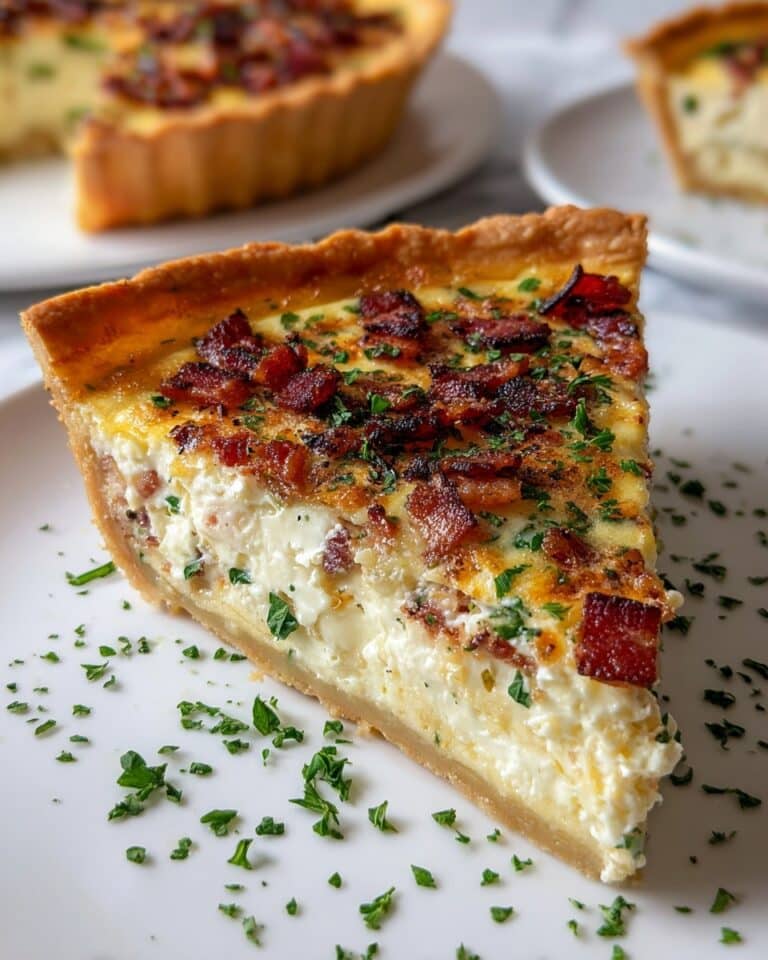 Classic French-Style Quiche with Cheese, Bacon, Ham, Spinach, and Caramelized Onion Recipe