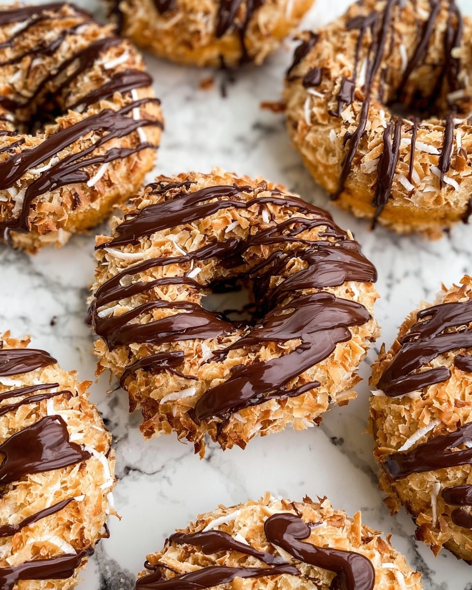 A stack of five festive cookies with a golden-brown base and a soft, slightly crumbly texture, each cookie studded generously with white chocolate chunks, dark chocolate chips, and small, round red and green candy pieces scattered throughout. The top cookie has a bite taken out, revealing more chocolate pieces inside and the soft, moist interior. The cookies are stacked neatly on a black wire rack, with a blurred white marbled surface in the background. photo taken with an iphone --ar 4:5 --v 7