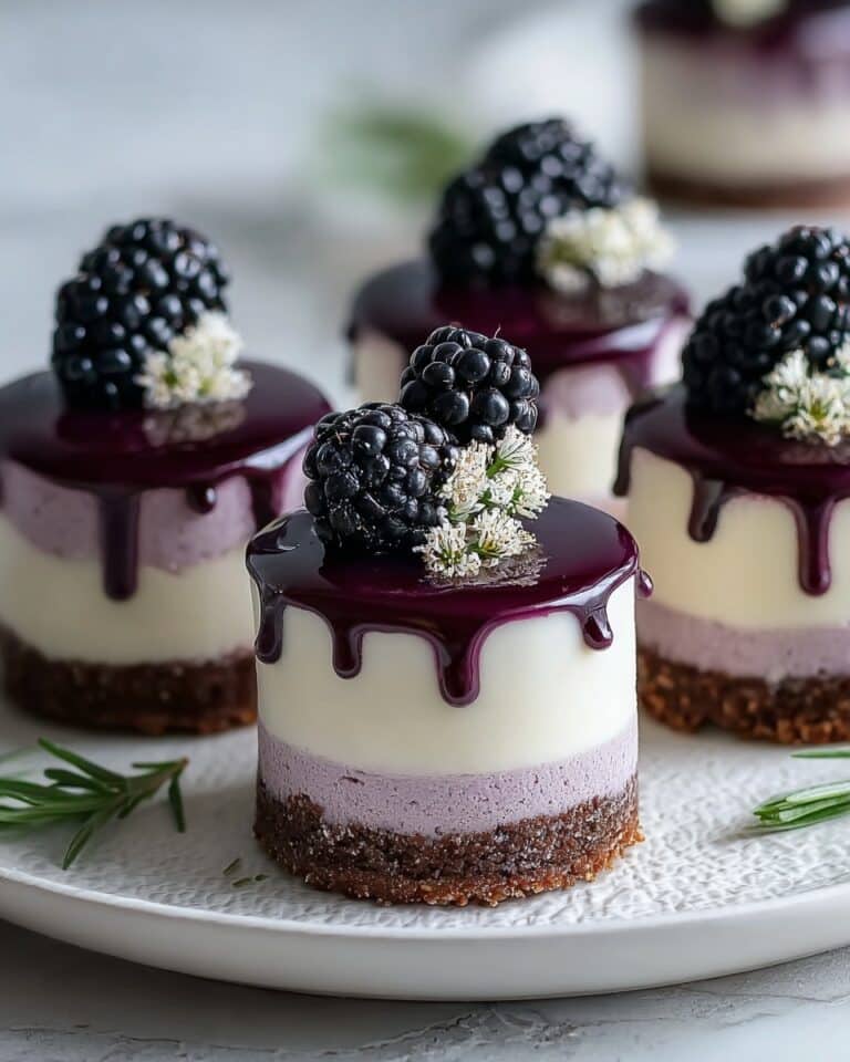 Mini Blackberry Mousse Cakes with White Chocolate and Edible Violets Recipe